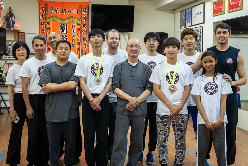 SiGong Elmond Leung after class with students and Sifu Matyas Tamas in August 2019